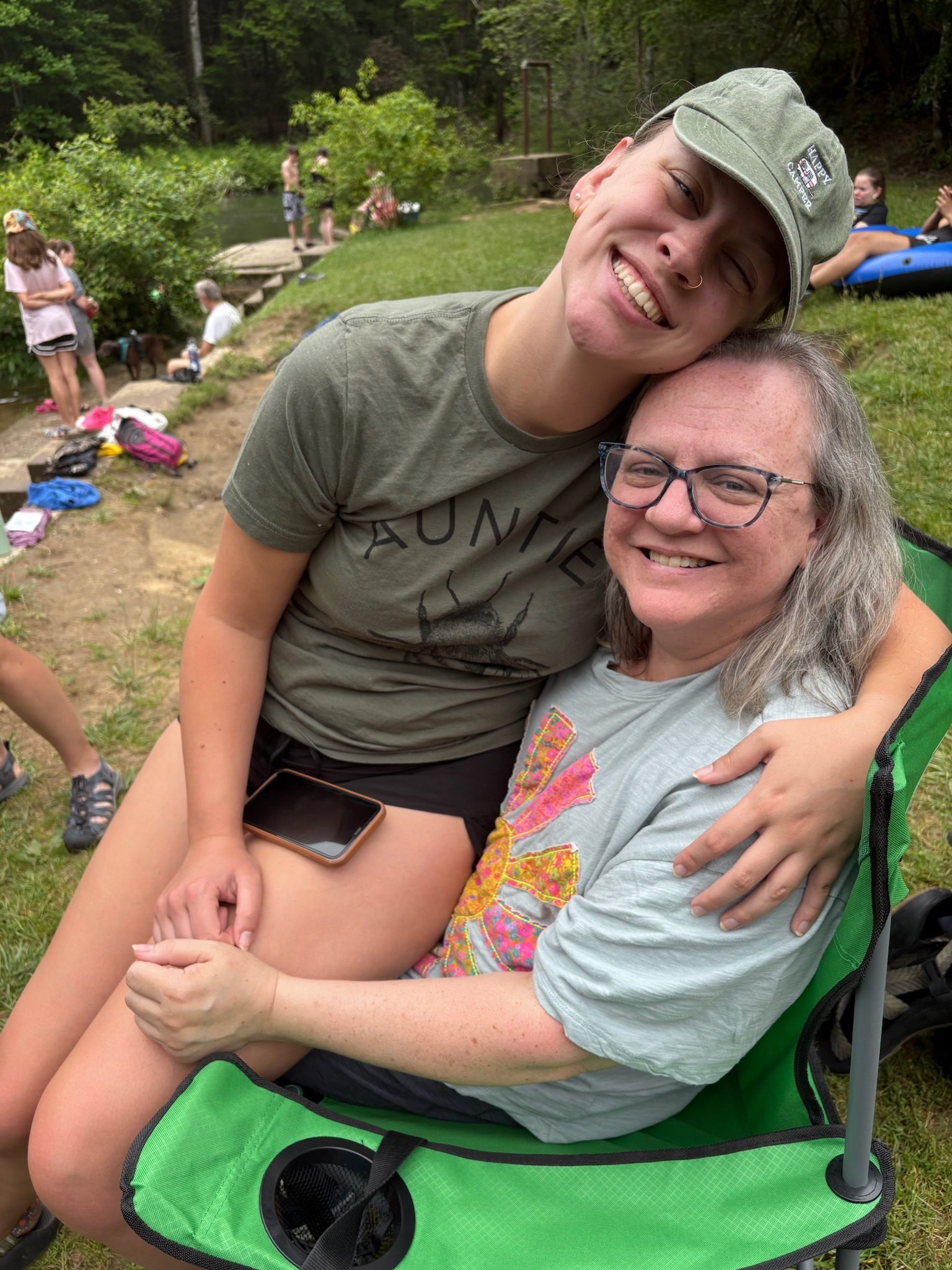2025 FCF Lara 06 Brooke sits in Lara's lap and gives a sweet hug