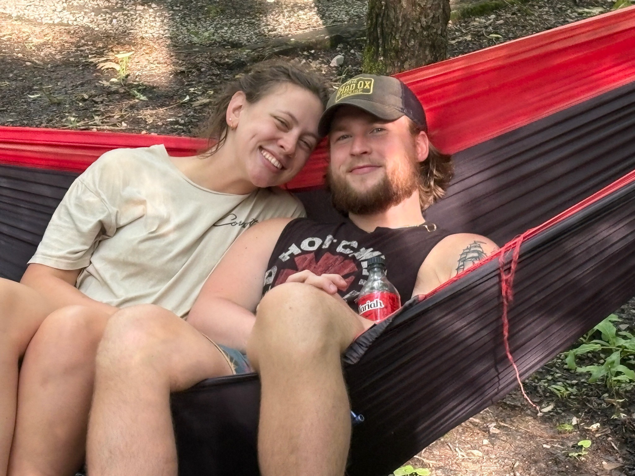 2025 FCF Lara 21 Brooke and Jackson Cleland sitting close together in a hammock